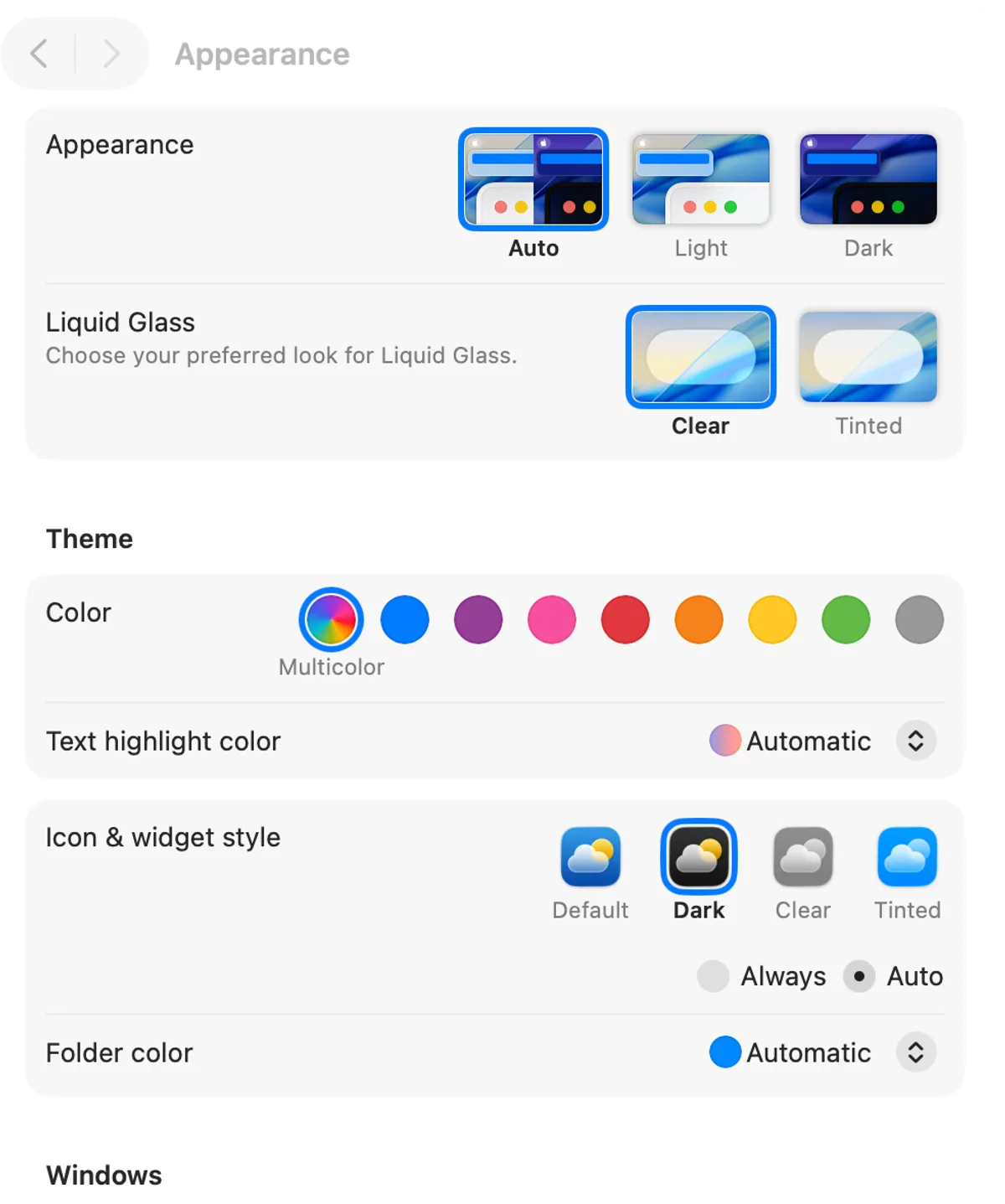 System Settings › Appearance on macOS 26 Tahoe: Light, Dark and Auto, Liquid Glass Clear or Tinted, the theme color and Icon & widget style